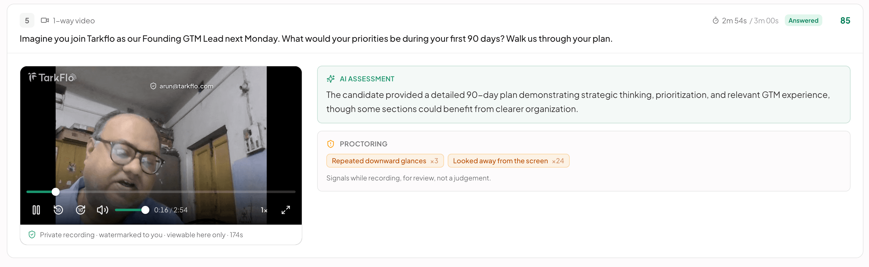 A one-way video answer to the 90-day plan question: the recording (private, watermarked to the viewer), the AI assessment, and proctoring signals listed for review, not judgement