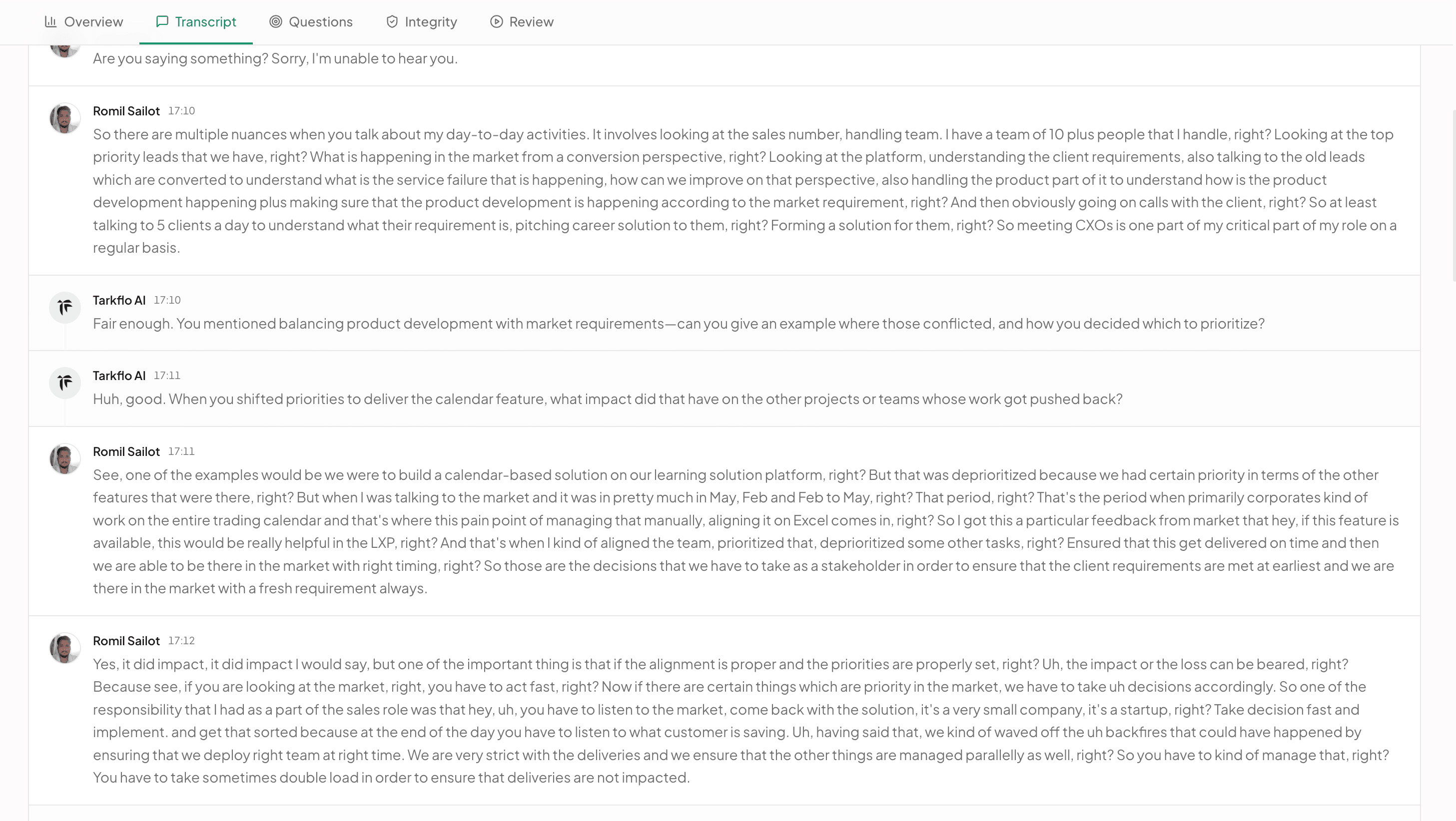 The Transcript tab of the same report: a timestamped exchange between Tarkflo AI and Romil Sailot on balancing product development against market requirements